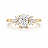 Gold ring with a large diamond and smaller diamonds on the sides against a white background